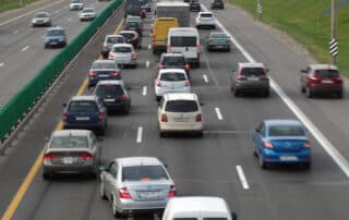 Heavy traffic on multi-lane highway during daytime